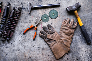 The set of old tools on the floor
