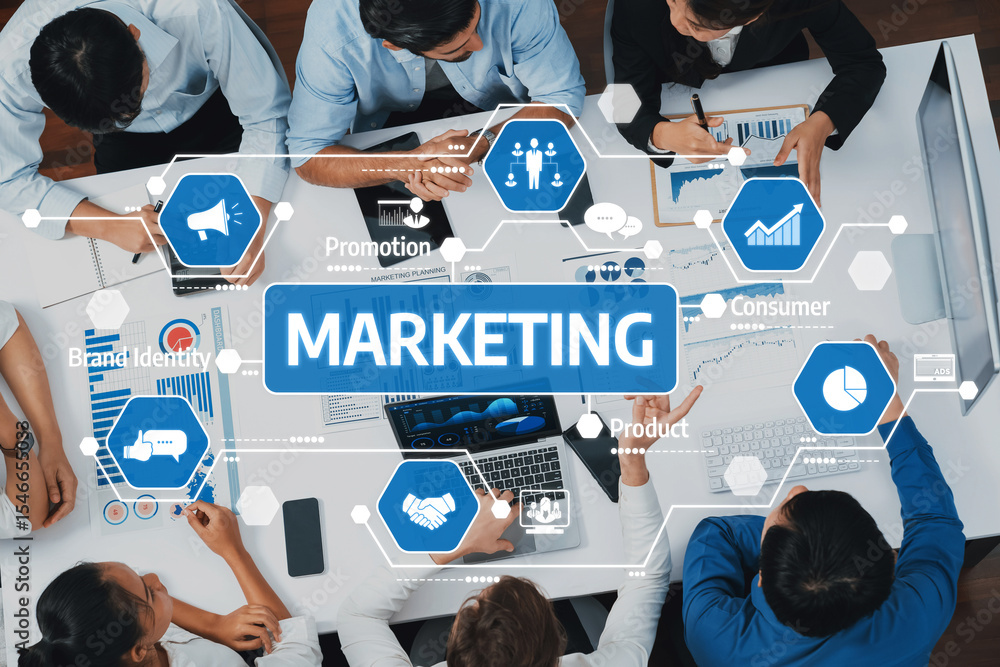 Aufkleber A dynamic team engages in collaborative marketing strategies, analyzing data and discussing innovative ideas to enhance brand identity and consumer engagement effectively. Amity