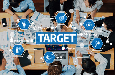 Engaging team meeting focused on strategic planning and target achievement, featuring...