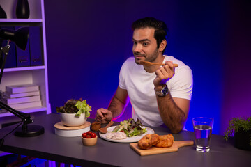 Healthy influencer in host channel tasting chicken meat ingredient health on diet life in mixed salad for easy cooking product by self with tasty food on social media live on meal time. Surmise.