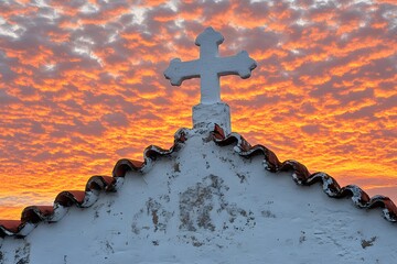 White cross silhouette radiant sky