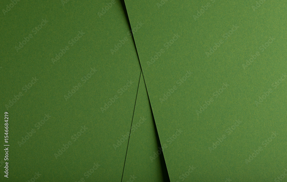 Poster Designer paper background in green. Matte and smooth surface with fiber texture, geometric overlap