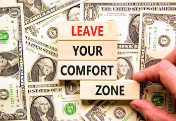 Leave your comfort zone symbol. Concept words Leave your comfort zone on beautiful wooden blocks....
