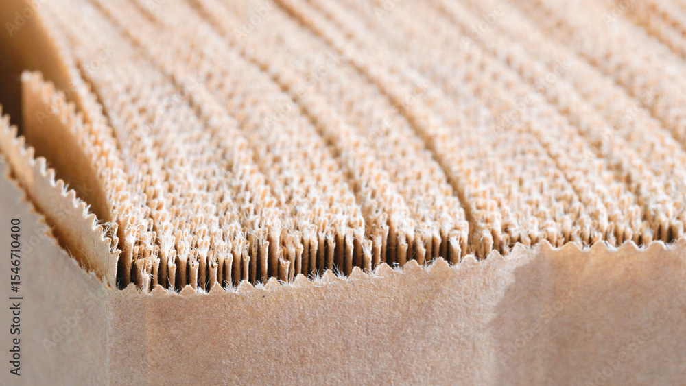 Poster A long brown strip of thin sheets of kraft paper with a line pattern. texture is rough and the lines are close together, creating a sense of depth and volume.