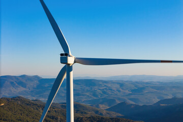 Wind turbine in mountain, Energy transition with wind power farm with carbon neutral