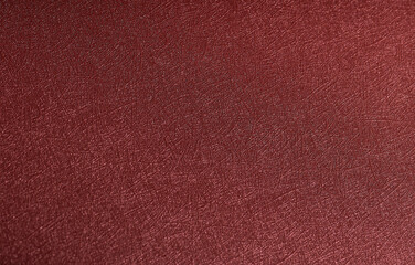 Minimalistic designer paper closeup. Monochrome red and marsala background with glossy metallic