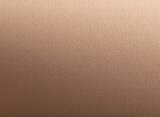 Paper closeup in beige and cream tones. Designer paper with smooth gradient, matte grained texture,