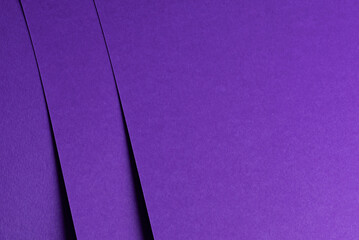 Premium designer paper in bright and dark violet purple tones with matte surface and elegant texture