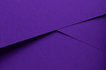 Premium designer paper in violet and purple tones with matte surface and elegant texture.