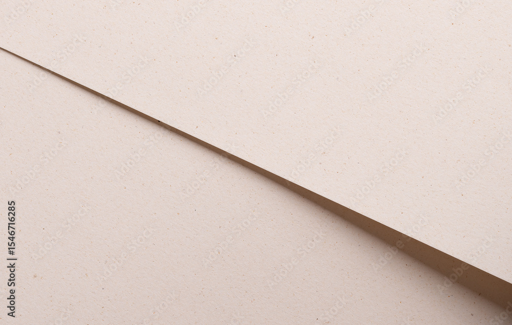 Poster premium texture of elegant paper in beige and cream tones with speckled porous surface. overlapping