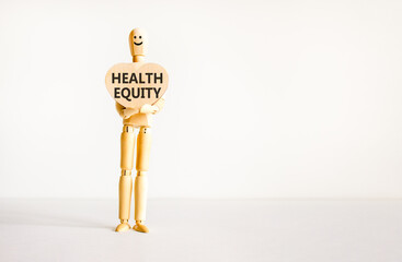 Health equity symbol. Concept words Health equity on beautiful wooden heart. Doctor's model....