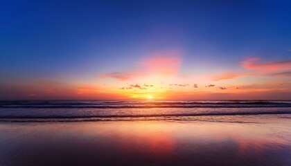 Obraz premium sunset sky on the beach with twilight in the evening as the colors of sunset horizon scene