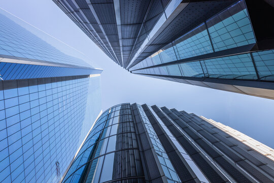 Modern Skyscrapers in London with Glass Facades and Clear Sky