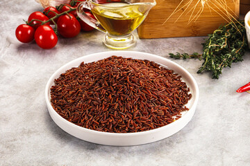 Red raw dry rice gor cooking