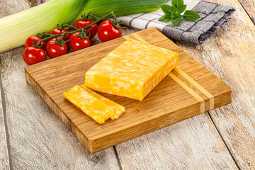 Marble yellow cheese with slices