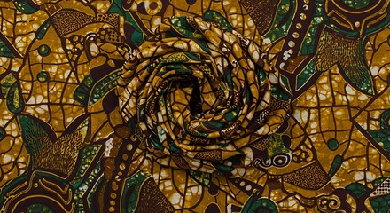 Swirling Gold and Green African Print Fabric Detail