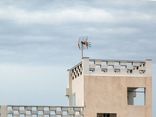 Building unique art, architectural feature upper levels, chair, cage-like suspended in the air, a form of public art, observation point, conceptual piece space, height, interaction with architecture 