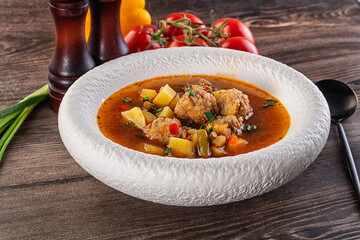Tomato Soup with meatballs and vegetables