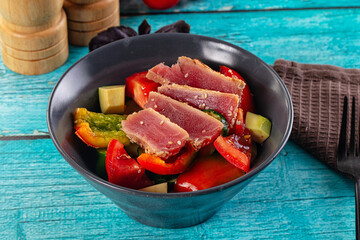 Salad with tuna tataki and avocado