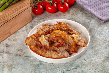 Fried crispy pork bacon snack