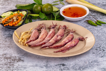 Boiled wild mini calamari snack