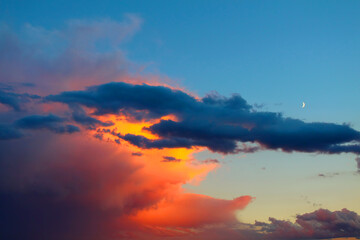 Evening light falls on a summer thunderstorm in the Midwest United States