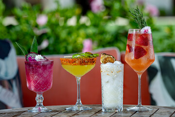 A Selection of Colorful Cocktails on an outside patio.