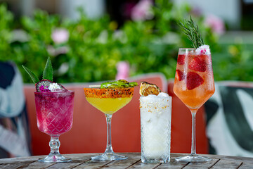 A Selection of Colorful Cocktails on an outside patio.