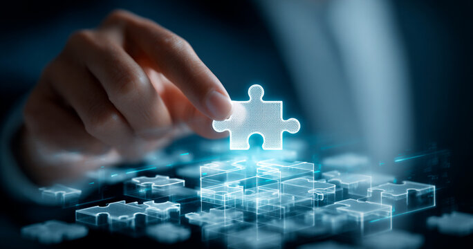 Hand inserting a jigsaw puzzle piece into a database structure, symbolizing foreign key integration