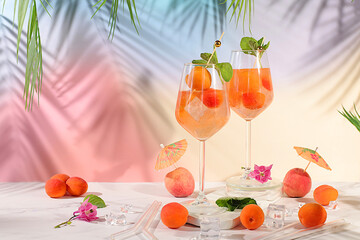 Modern still life with fruits. Royal lemonade cocktail with peach, apricot, mojito with tequila,...