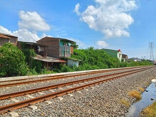 Fototapeta premium A rail road with beautiful blue sky views