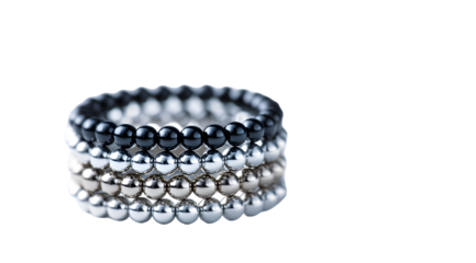 Elegant stack of beaded rings in black silver and gold dark metal beads on transparent background