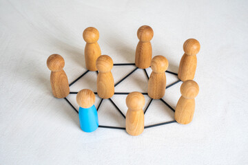 Blue man in a connected network of people. Workplace structure, professional communication, or...