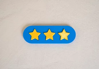  Rating three stars. Feedback systems, user reviews, customer satisfaction, or product evaluation platforms. © Andrii Yalanskyi