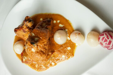Delicious Indian Butter Chicken Tikka Masala with Lychees and Radish