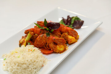 Delicious Spicy Shrimp Curry with Rice and Garnish
