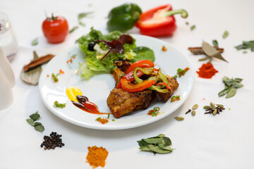 Delicious Grilled Lamb Chops with Peppers and Salad