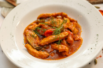 Delicious Chicken Tikka Masala in a White Bowl