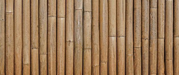 Bamboo wall texture abstract background, Old brown tone bamboo plank wall texture for background. Bamboo fence