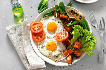 Breakfast table Breakfast plate fried eggs vegetables mushrooms toast top view healthy table