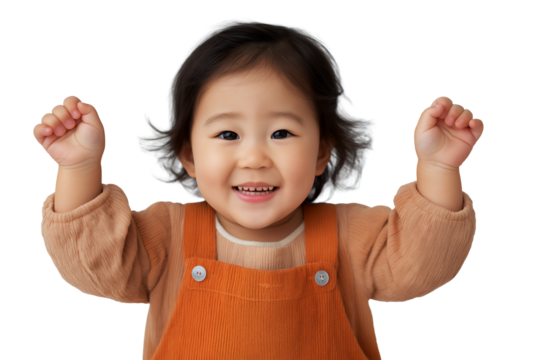 Adorable Asian toddler girl with hands up and smiling, isolated on white or transparent background