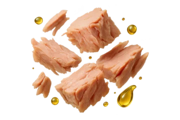 Selbstklebende Fototapeten Chunks of tuna with oil drops isolated on a transparent background, cut-out © whitestorm