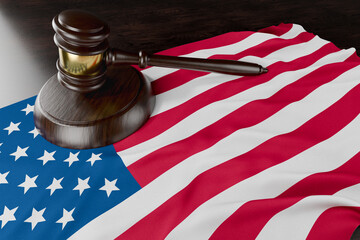American Flag and Wooden Gavel Resting on Desk.