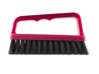 A pink and black brush with a pink handle