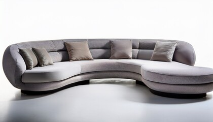 a curved sectional sofa in pale gray with a sleek modern design isolated on white