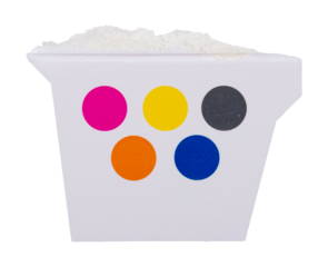 CMYK print calibration with offset printing marks and color test on torn piece of white cardboard