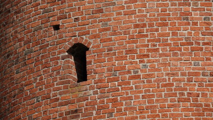 Wieża obronna i mieszkalna w starym zamku z widocznymi otworami okiennymi © tomo81