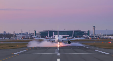 Airplane Landing Stunning Twilight View at the Airport Runway
