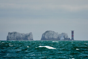 Moody Skies Over Emerald Waves with the view to Isle of White – New Forest Beach, England © Ramil