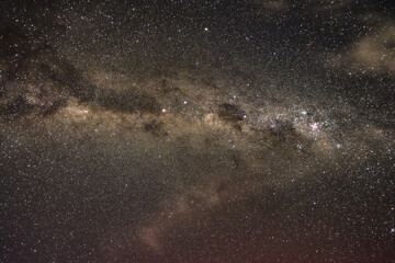 Aurora Australis tinged Milky Way night sky